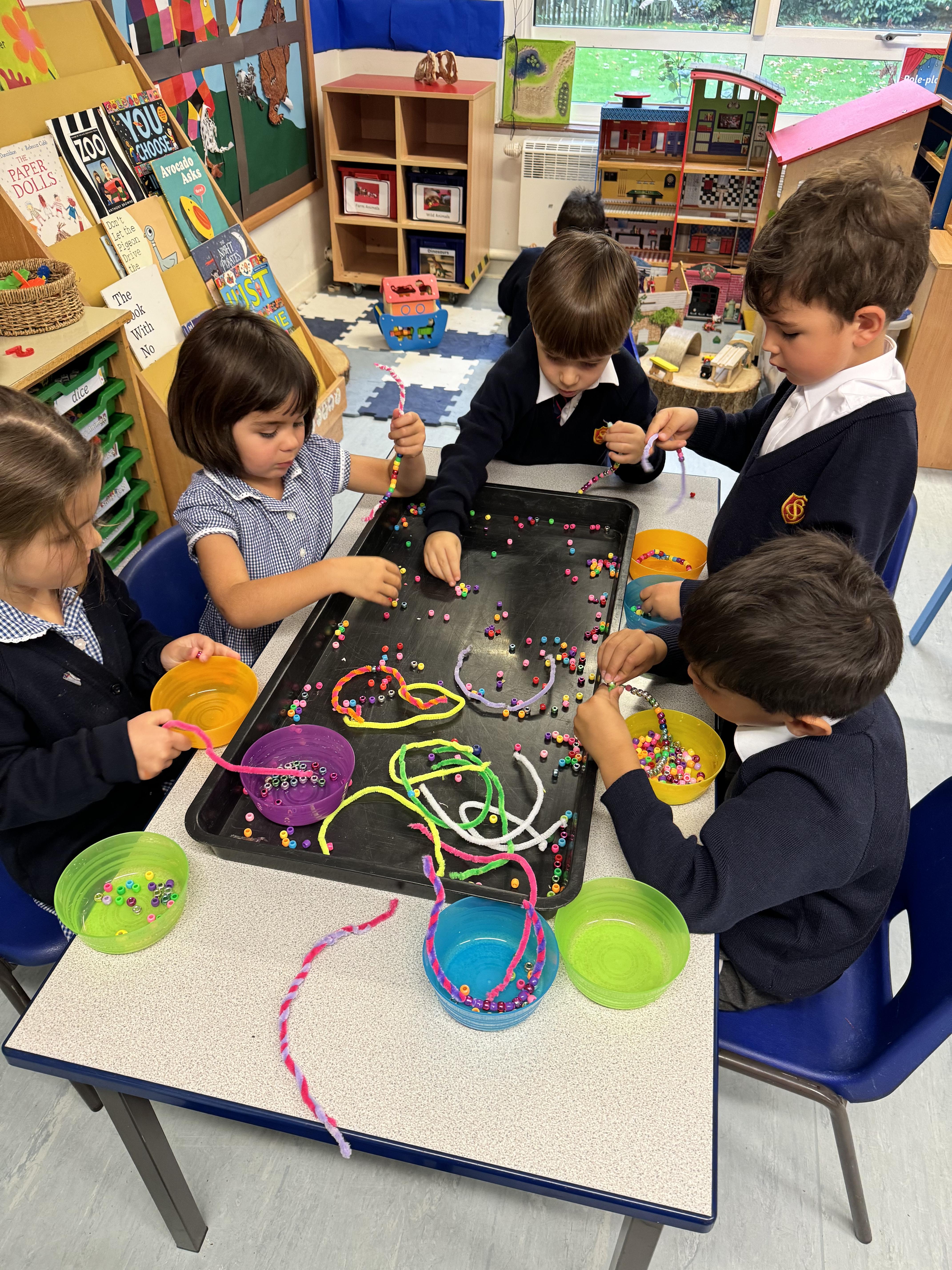 Getting to grips with threading beads.